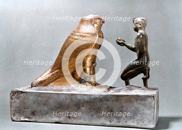 Taharqa in front of the falcon Hemen, Ancient Egyptian, 7th century BC. Artist: Unknown