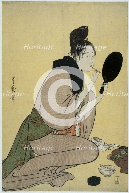 Bijin-ga. Girl applying makeup to her lips. Artist: Utamaro, Kitagawa (1753-1806)