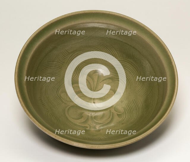 Bowl with Floral and Wave Pattern, Jin dynasty (1115-1234), 12th/13th century. Creator: Unknown.