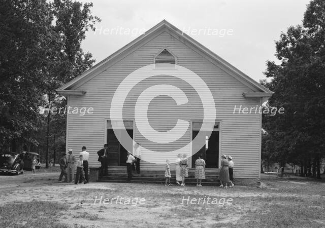 Possibly: Congregation entering church, Wheeley's Church, Person County, North Carolina, 1939. Creator: Dorothea Lange.