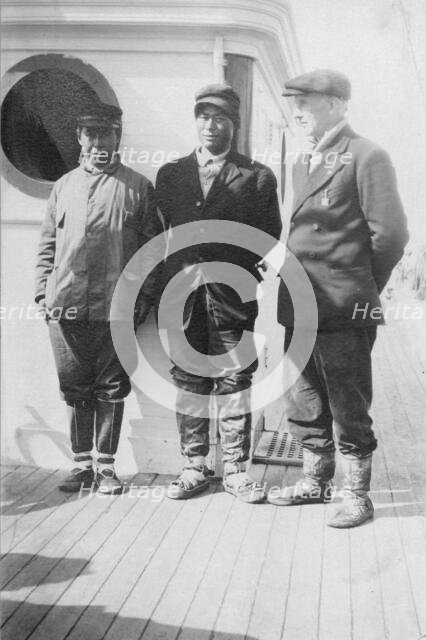 Eskimo boy in center who went with Mr. Lapp [i.e. Mr. William Thomas Lopp] on relief..., c1900-c1930 Creator: Unknown.