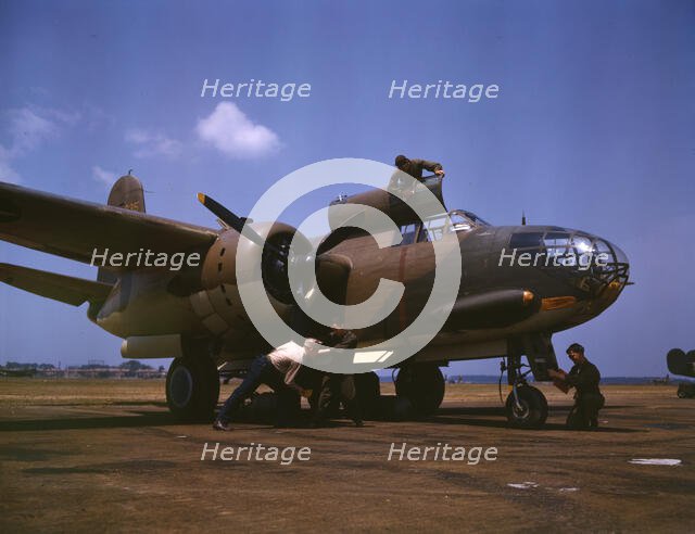 Servicing [an] A-20 bomber, Langley Field, Va., 1942. Creator: Alfred T Palmer.