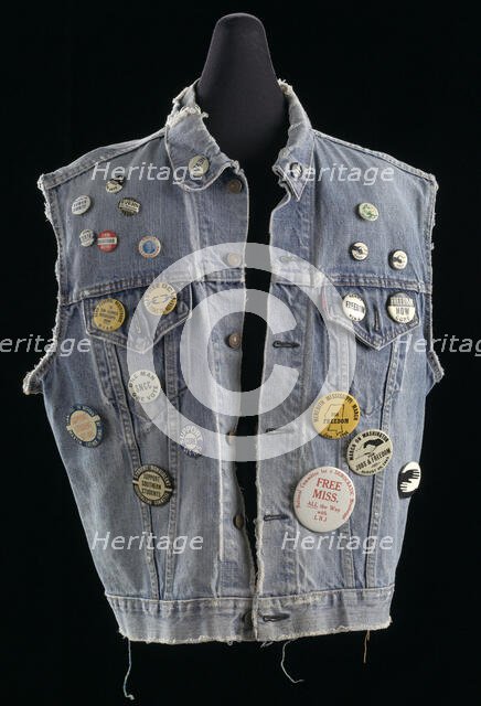 Commemorative denim vest with buttons assembled by Joan Trumpauer Mulholland, 1960s. Creator: Unknown.