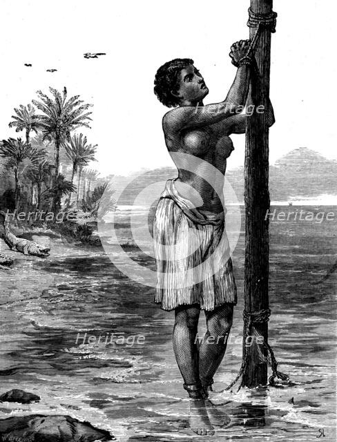 The Gold Coast and Ashantee War: a girl sacrificed to Ju-Ju, 1873. Creator: W Hollidge.