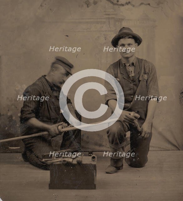 Two Plumbers with a Pipe, Pipe Cutter, and Toolbox, 1870s-80s. Creator: Unknown.