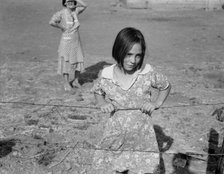 One of Chris Adolph's younger children, FSA Rehab..., near Wapato, Yakima Valley, Washington, 1939. Creator: Dorothea Lange.