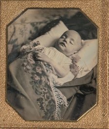 Postmortem Baby, Partially Covered by a Flowered Shawl with a Fringe Hem, 1840s. Creator: Unknown.