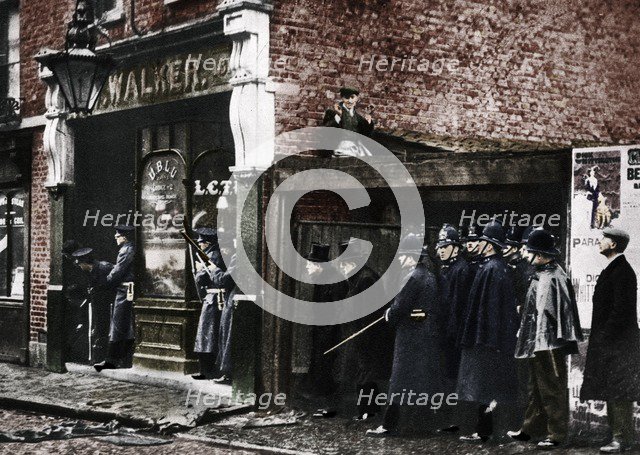 The Sidney Street siege, Whitechapel, London, 1911, (1935).  Artist: Unknown.