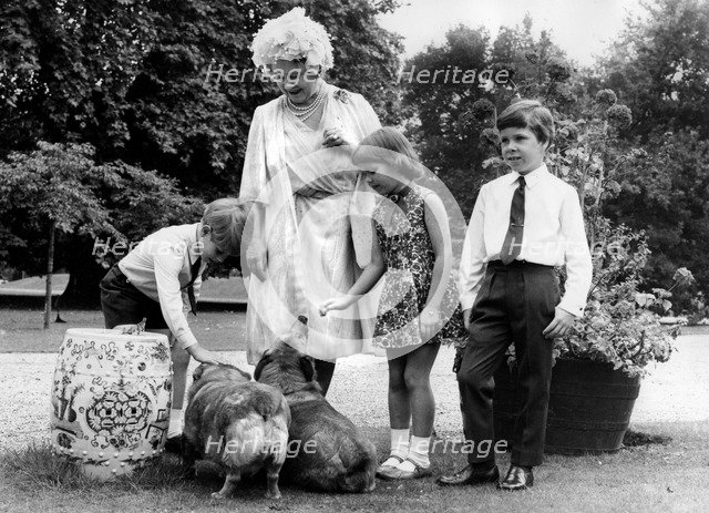 The Queen Mother, with three of her grandchildren, Clarence House, London, 1970. Artist: Unknown