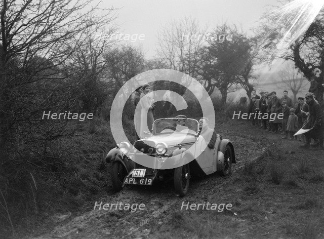 Singer open sports of WJD Richardson, Sunbac Colmore Trial, near Winchcombe, Gloucestershire, 1934. Artist: Bill Brunell.