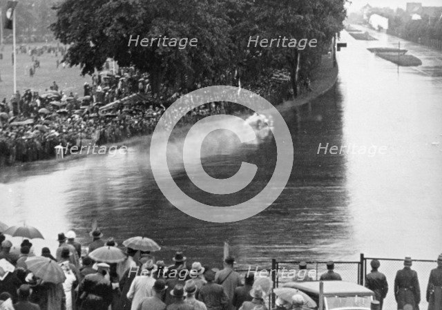 Auto Union in action at the Avus motor racing circuit, Berlin, Germany, 1934. Artist: Unknown