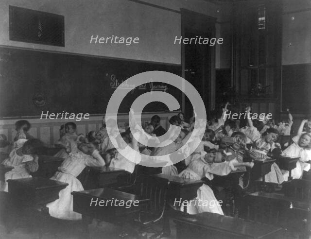 Classroom scenes in Washington, D.C. public schools - stretching and yawning exercise..., (1899?). Creator: Frances Benjamin Johnston.