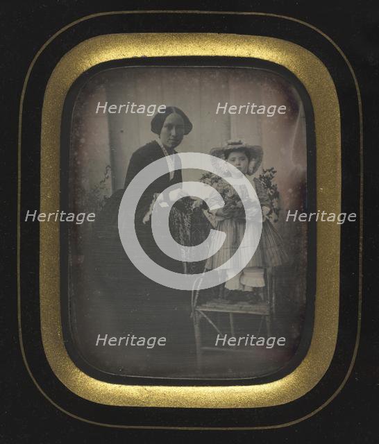 Child Standing on a Chair Holding Flowers, with Mother, c. 1855. Creator: Unidentified Photographer.