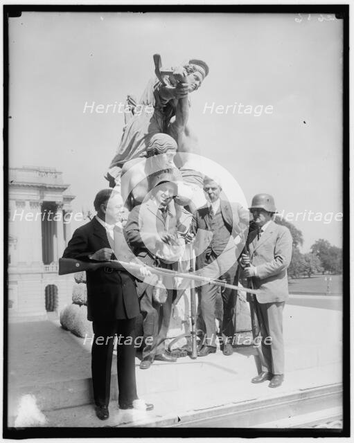Senator Thompson & German war relics, c1914-1920. Creator: Harris & Ewing.