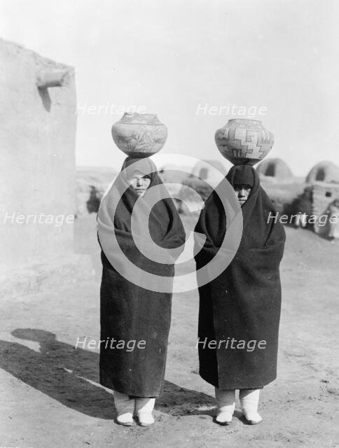 Zuni water carriers, c1903. Creator: Edward Sheriff Curtis.