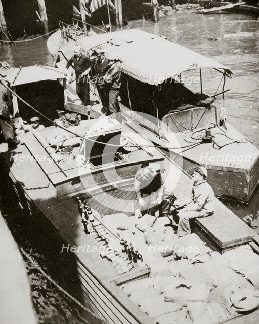 A rum-running boat caught smuggling in 2000 bottles, USA, 1920s. Artist: Unknown