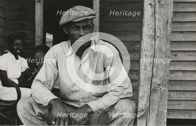 Sharecropper on Sunday, Little Rock, Ark, October 1935. Creators: Farm Security Administration, Ben Shahn.