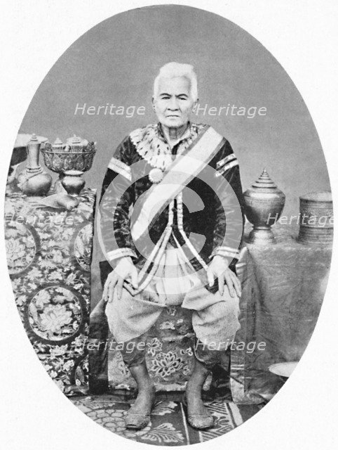 A Lao chief, 77 years old, In Siamese uniform, 1902. Artist: James McCarthy.