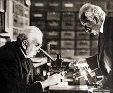 Louis and Auguste Lumière (1864-1948 and 1862-1954), French chemists and biologists in their labo…