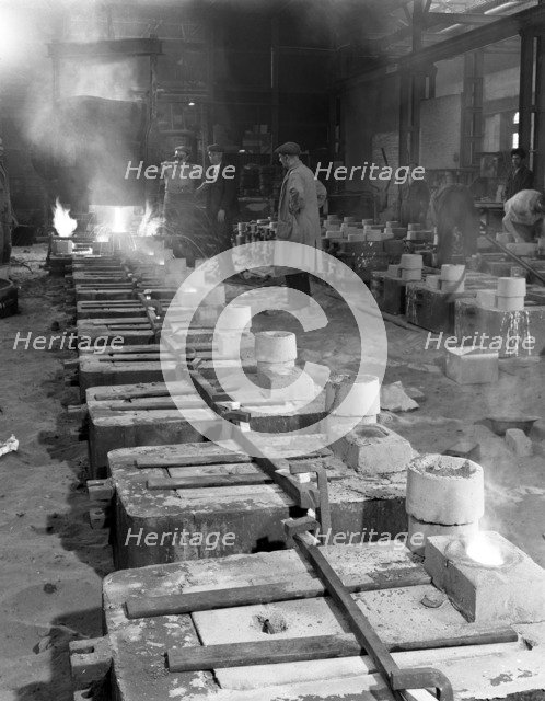 Pouring small castings, Edgar Allen Steel Co, Sheffield, South Yorkshire, 1963.  Artist: Michael Walters