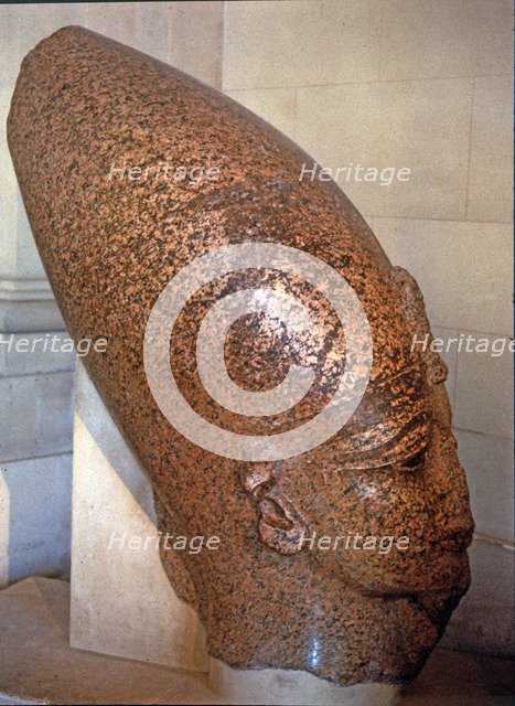 Head of Amenhotep III, on pink granite, it comes from his temple at Thebes.