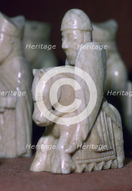 A Knight - The Lewis Chessmen, (Norwegian?), c1150-c1200. Artist: Unknown