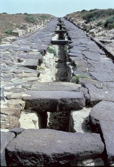 Cardus Maximus Street with underground conduction of water, in the Phoenician-Punic-Roman city of…