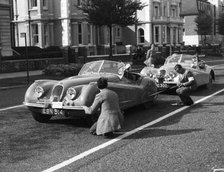 Officials measuring Jaguar XK120, 8 clubs rally Eastbourne 1952. Reg EBN 514. Creator: Unknown.
