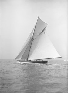 The 45 ton cutter 'Varia' under sail, 1911. Creator: Kirk & Sons of Cowes.