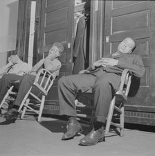 Firemen taking a nap in engine house number four, Washington, D.C, 1943. Creator: Gordon Parks.