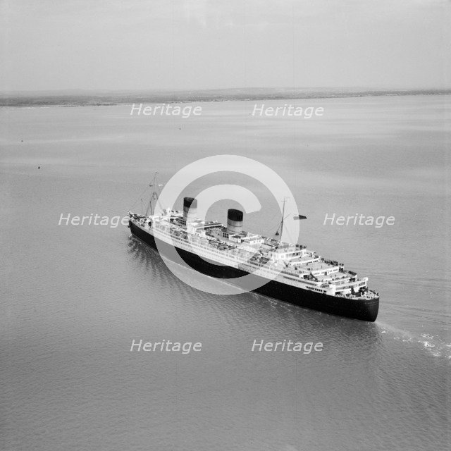 RMS 'Queen Elizabeth' in the Solent approaching Southampton Water, Hampshire, 1949. Artist: Aerofilms.