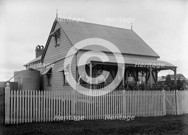 Unknown family portrait and family with monkey on verandah, c1900s. Creator: Robert Augustus Henry L'Estrange.