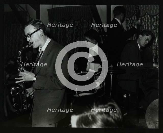 The John Cox Trio and Derek Humble playing at the Civic Restaurant, Bristol, 1955.  Artist: Denis Williams