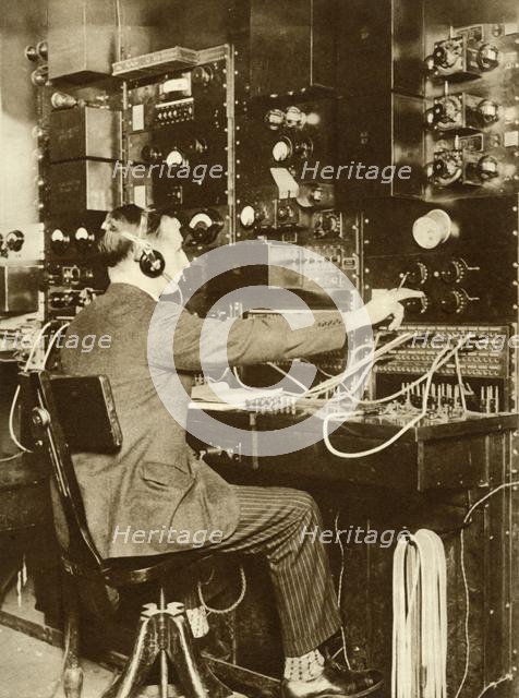 First transatlantic telephone call, from London to New York, 7 March 1926, (1935). Creator: Unknown.