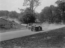Two Wolseleys racing, Donington Park Race Meeting, Leicestershire, 1933. Artist: Bill Brunell.
