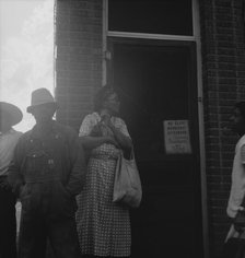 Untitled, 1935-1942. [African-Americans outside a shop]. Creator: Unknown.