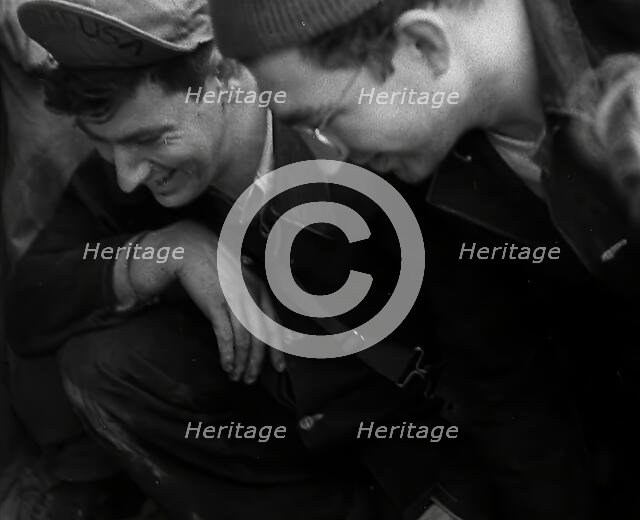 American Airmen Gambling Over a Game, 1943-1944. Creator: British Pathe Ltd.