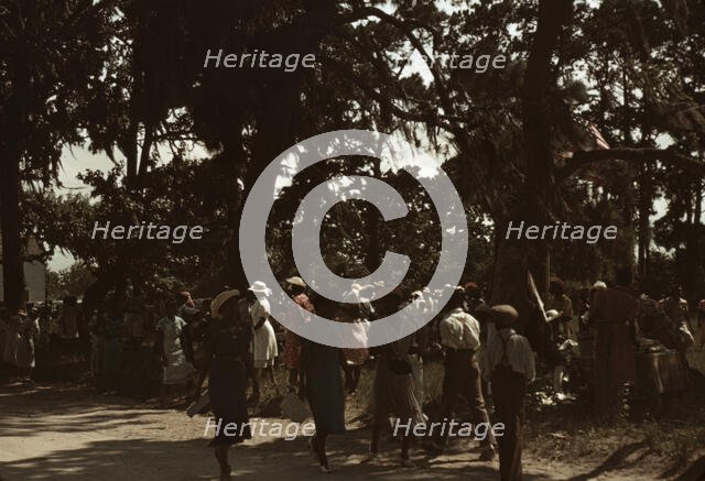 A Fourth of July celebration by a group of Negroes, St. Helena Island, S.C., 1939. Creator: Marion Post Wolcott.