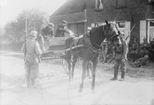 Belgian peasants showing pass to sentries, between 1914 and c1915. Creator: Bain News Service.