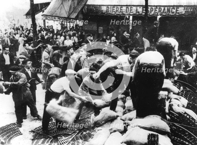 Constructing a barricade, Paris, 1944. Artist: Unknown