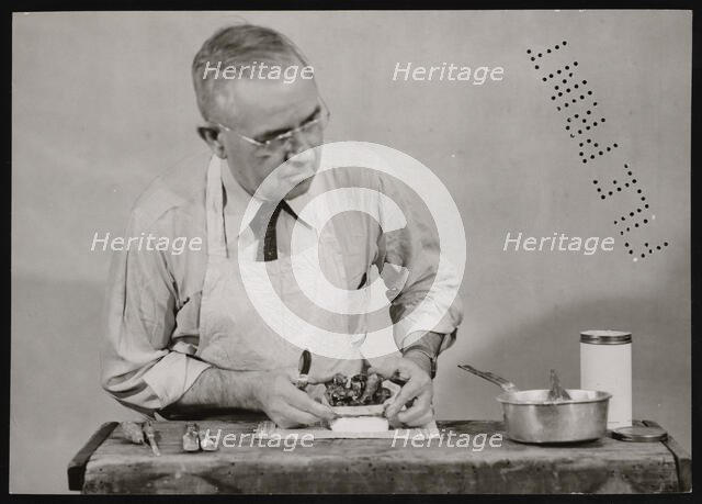 Frank Earl Holden Demonstrates Cutting into Mineral, January 18, 1951. Creator: United States National Museum Photographic Laboratory.