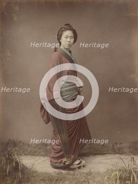 Woman with Closed Umbrella, 1870s-1890s. Creator: Kusakabe Kimbei.