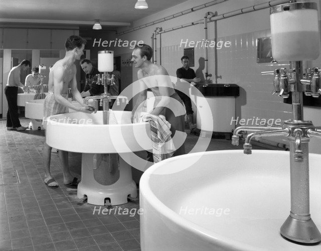 Workers in the washroom facility at a steelworks, Rotherham, South Yorkshire, 1964. Artist: Michael Walters