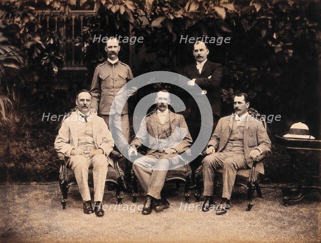 The five members of the Bombay Plague Committee, three sitting, two standing, 1897. Creator: Captain C  Moss.