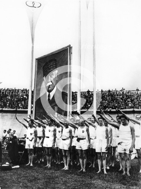 Athletes giving the fascist salute, Parc des Princes, Paris, 1941. Artist: Unknown
