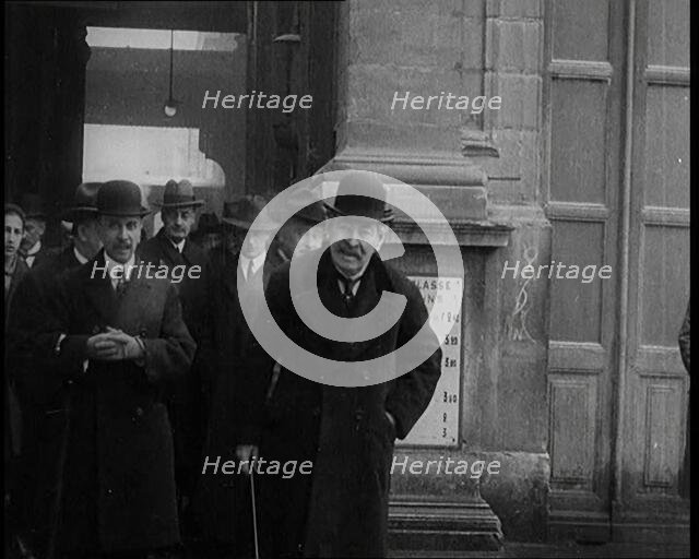 The French Prime Minister Aristide Briand Standing Outside with a Group of Male Civilians..., 1926. Creator: British Pathe Ltd.