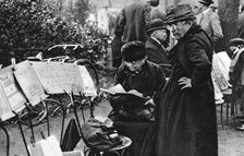 Stamp sellers in the Champs Elysees, Paris, 1931.Artist: Ernest Flammarion
