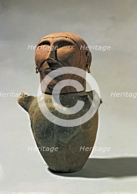 Anthropomorphic funerary urn.