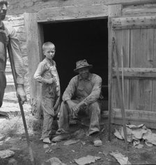 Tobacco people take it easy after their morning's work..., Granville County, North Carolina, 1939. Creator: Dorothea Lange.