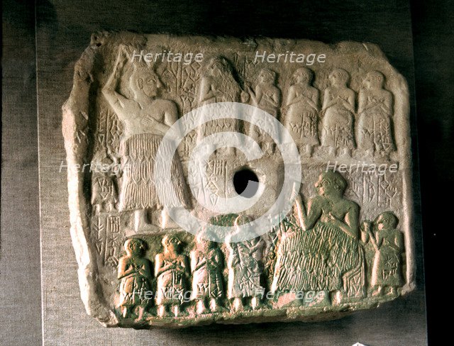 Ur-Nanshe, king of Lagash commemorates the construction of a temple, relief in limestone.